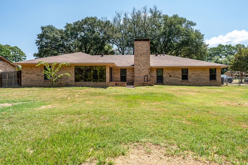 Cleared, spacious backyard